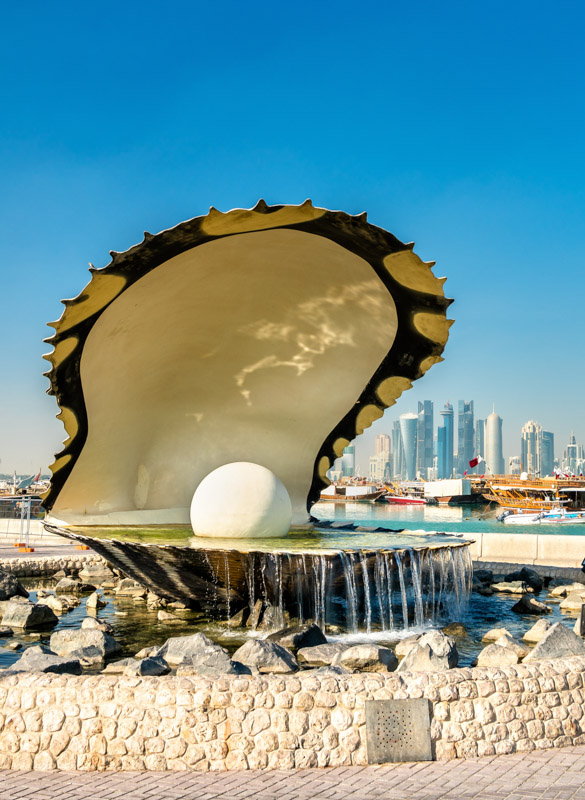Oyster and Pearl Fountain on Corniche Seaside Promenade in Doha, Qatar Oyster and Pearl Fountain on Corniche Seaside Promenade in Doha, Qatar